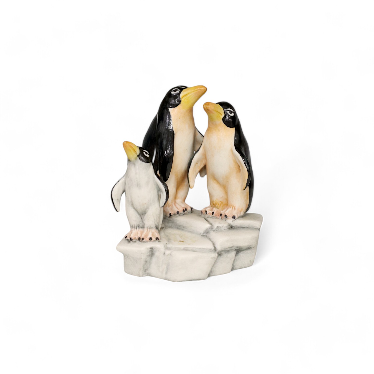 A Guido Cacciapuotti (1892-1953), porcelain three penguin group standing on ice, impressed signature, 9cm high. Condition - good